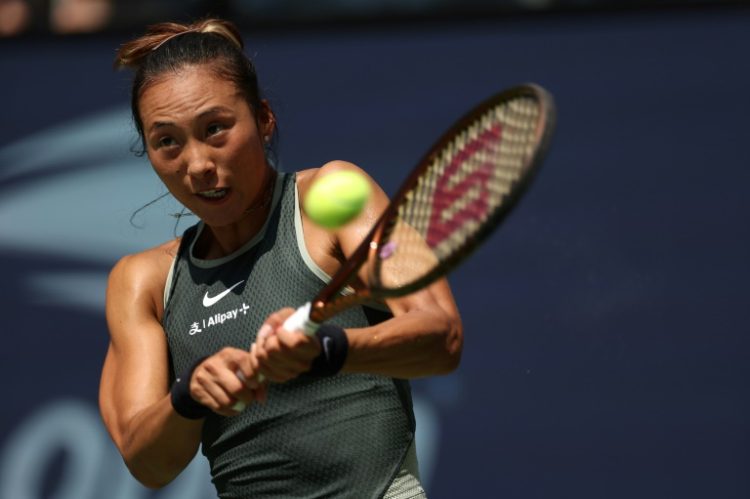 Battling back: Olympic gold medallist Zheng Qinwen rallies from a set down to beat Amanda Anisimova in the first round of the US Open. ©AFP