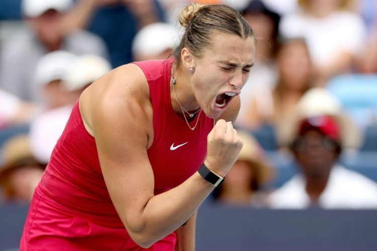 Third-ranked Aryna Sabalenka of Belarus celebrated winning match point against top-ranked Iga Swiatek of Poland in a WTA Cincinnati Open semi-final. ©AFP