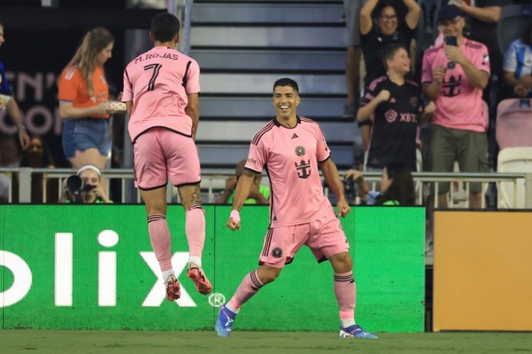 Luis Suarez of Inter Miami celebrates his second goal with Matías Rojas in the 2-0 win over Cincinnati in MLS on Saturday.. ©AFP