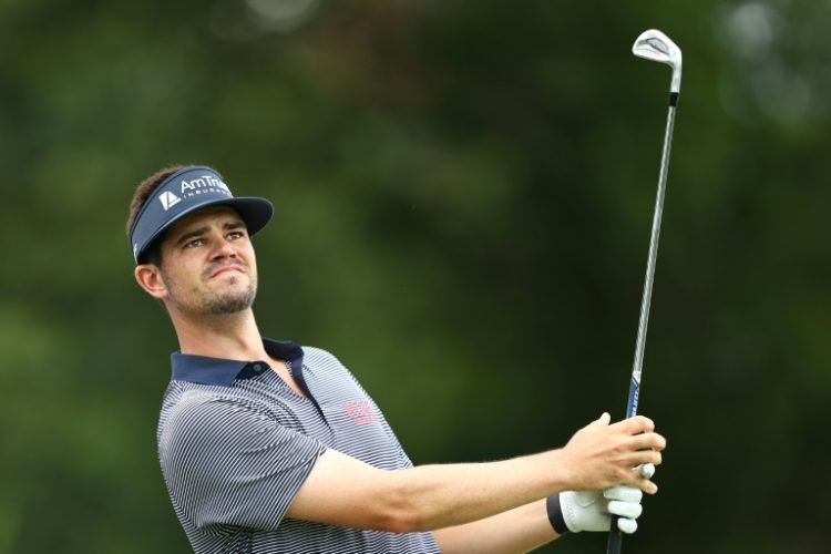 American Beau Hossler fired a 10-under par 60 to grab an early four-stroke lead in the first round of the rain-hit PGA Wyndham Championhip. ©AFP