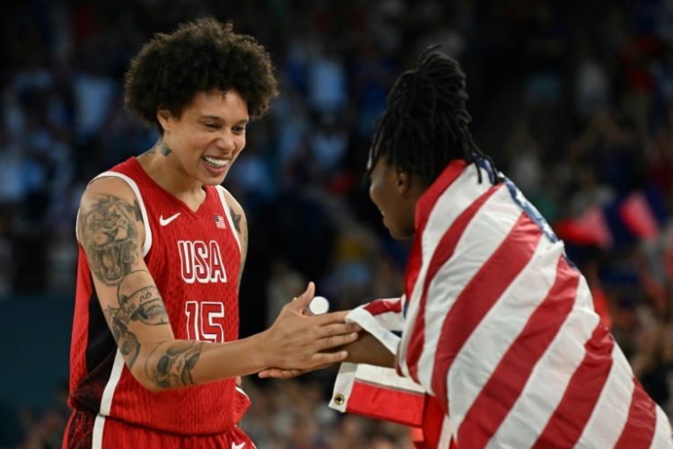 Brittney Griner celebrates after helping the USA win Olympic women's basketball gold. ©AFP