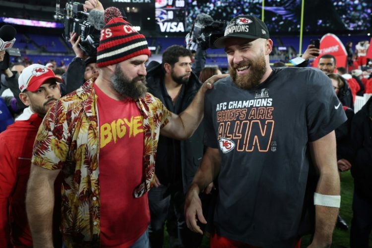 Travis Kelce celebrates the Kansas City Chiefs' win alongside his brother Jason Kelce in the AFC Championship Game in January 2024 in Baltimore, Maryland. ©AFP