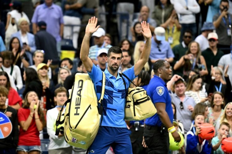 All over: Novak Djokovic waves at the crowd after his defeat against Australia's Alexei Popyrin . ©AFP