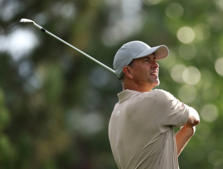 Leader Adam Scott of Australia watches his tee shot on the 4th hole during the second round of the BMW Championship at Castle Pines Golf Club, Colorado on Friday.. ©AFP