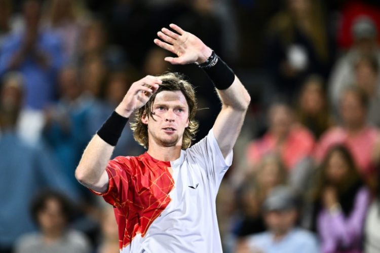 Andrey Rublev celebrates after eliminating top-ranked Jannik Sinner of Italy 6-3, 1-6, 6-2 to reach the ATP Montreal Masters semi-finals. ©AFP