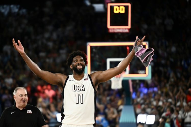 Joel Embiid of the United States celebrates the team's Olympic mens' basketball semi-final win over Serbia. ©AFP