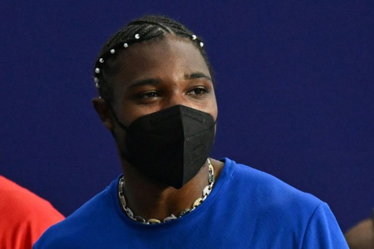 Noah Lyles is seen wearing a mask after finishing third in the 200 metres - he said he tested positive for Covid two days ago. ©AFP