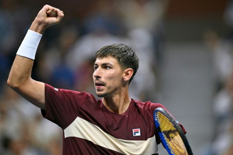 Shock victory: Alexei Popyrin celebrates after winning against Novak Djokovic . ©AFP