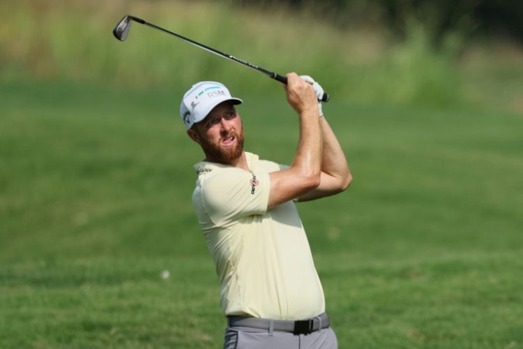 American Chris Kirk aced the par-3 14th hole on his way to firing a six-under par 64 for a one-stroke lead after the first round of the PGA St. Jude Championship. ©AFP