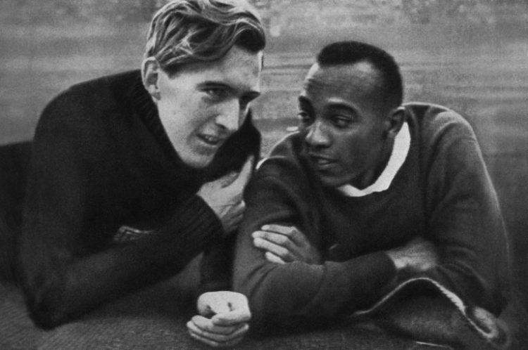 Jesse Owens and Luz Long chat at the Berlin Olympic Stadium during the 1936 Games. ©AFP