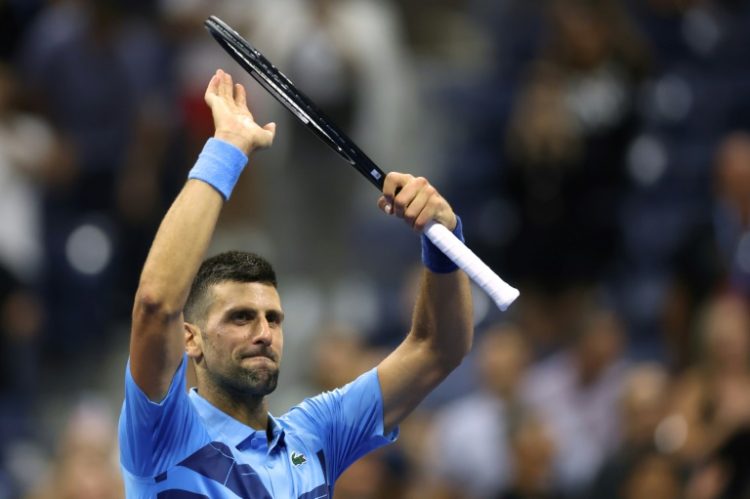 Defending champion Novak Djokovic acknowledges fans after his US Open first-round win over Radu Albot. ©AFP