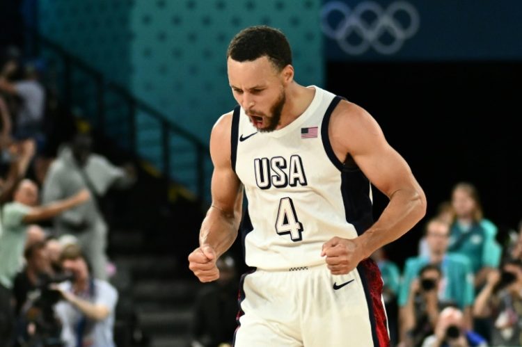 Stephen Curry of the United States celebrates after scoring in the US victory over Serbia in the Olympic men's basketball semi-finals. ©AFP