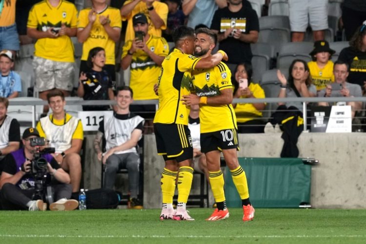 Columbus Crew striker Diego Rossi (R) scored twice in the reigning MLS champions' 3-2 home victory over Inter Miami. ©AFP