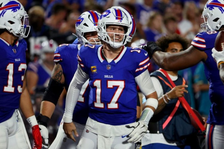 Buffalo quarterback Josh Allen celebrates after a touchdown in the Bills rout of Jacksonville. ©AFP