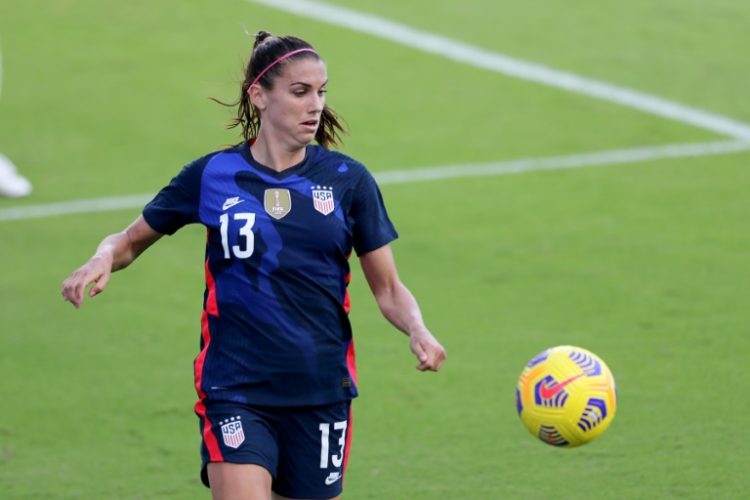 Alex Morgan, a star striker for the US women's national football squad, announced she will retire after a final club match and is pregnant with her second child. ©AFP