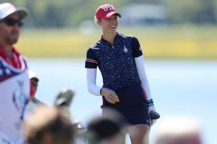 Top-ranked Nelly Korda of the United States smiles after hitting a drive during a practice round for the 19th Solheim Cup. ©AFP