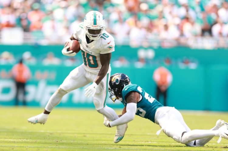 Miami police released more than 105 minutes of bodycam footage showing NFL star Tyreek Hill's detention by officers during a traffic stop. ©AFP