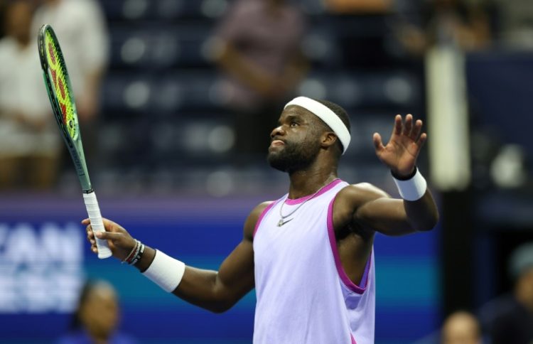 Victory moment: Frances Tiafoe gestures as he celebrates his win against Grigor Dimitrov . ©AFP