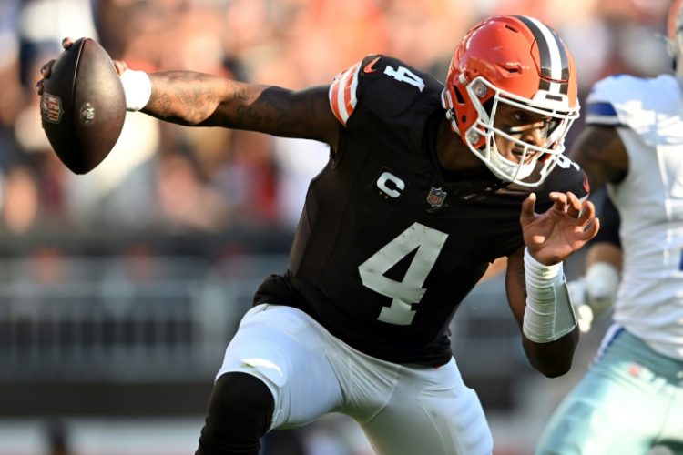 Deshaun Watson of the Cleveland Browns scrambles with the ball in the third quarter of the game against the Dallas Cowboys at Cleveland Browns Stadium on September 08, 2024.. ©AFP