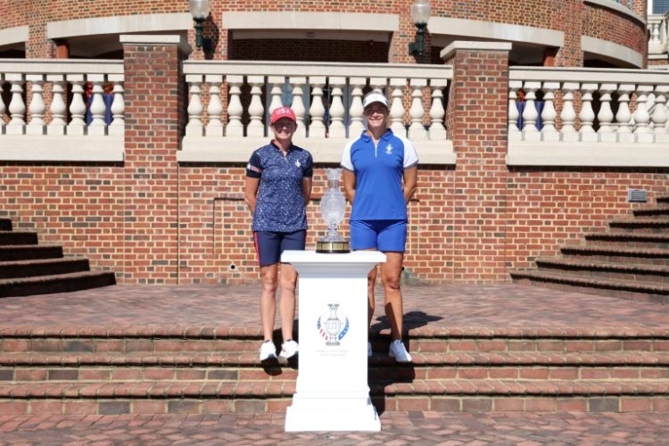 US Solheim Cup captain Stacy Lewis, at left with European captain Suzann Pettersen, shifted US driving range positions to solve a flap with Europe. ©AFP