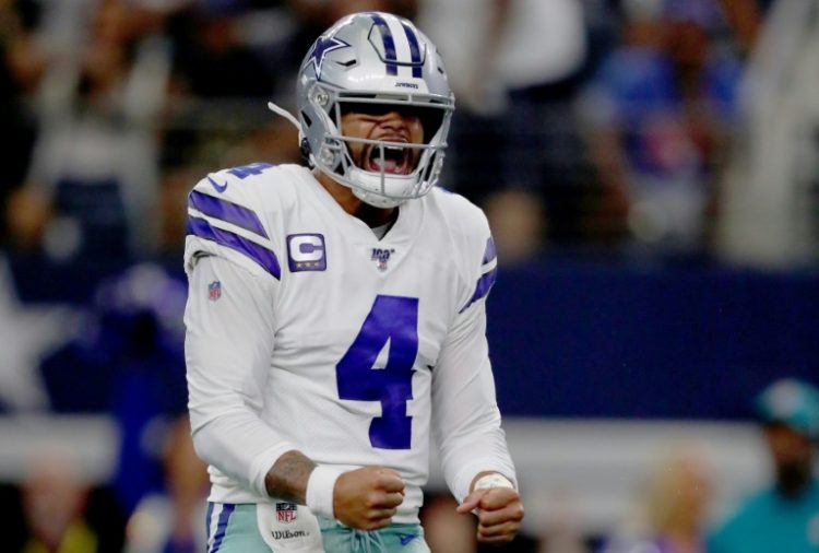 Dallas Cowboys quarterback Dak Prescott has agreed terms on a record-breaking four-year contract extension. ©AFP