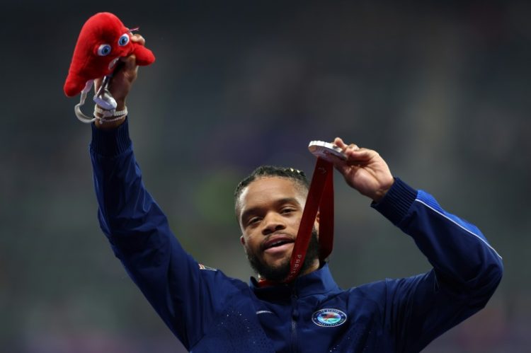 Noah Malone credits his mother in setting him on the path to Paralympic track and field stardom. ©AFP