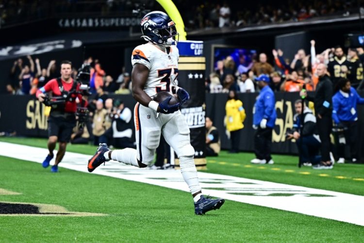 Denver's Javonte Williams scores a touchdown in the Broncos' NFL victory over the New Orleans Saints. ©AFP