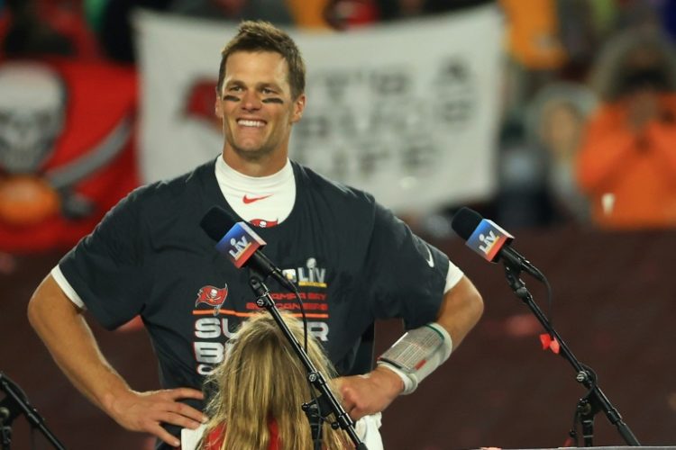 Seven-time Super Bowl champion quarterback Tom Brady was approved by NFL owners as a minority ownership partner in the Las Vegas Raiders. ©AFP