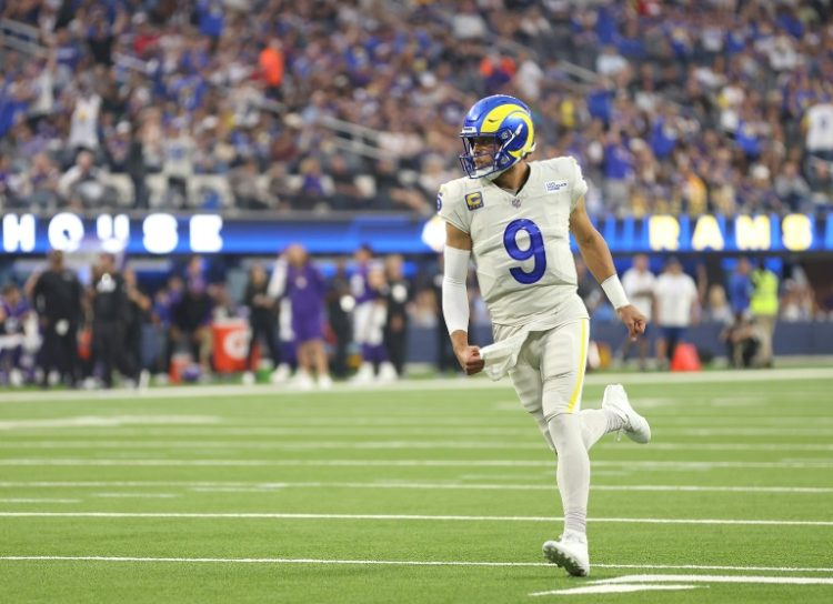 Los Angeles Rams quarterback Matthew Stafford celebrates a touchdown in an NFL victory over the Minnesota Vikings. ©AFP