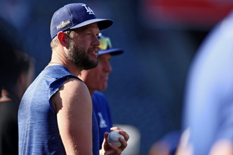 Veteran Dodgers pitcher Clayton Kershaw says he wants to 'give it a go' in 2025 after injuries limited his 2024 Major League Baseball season. ©AFP