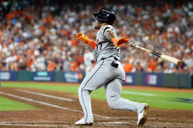 Andy Ibanez of the Detroit Tigers hits a three-run double in a series-clinching MLB playoff win over the Houston Astros. ©AFP