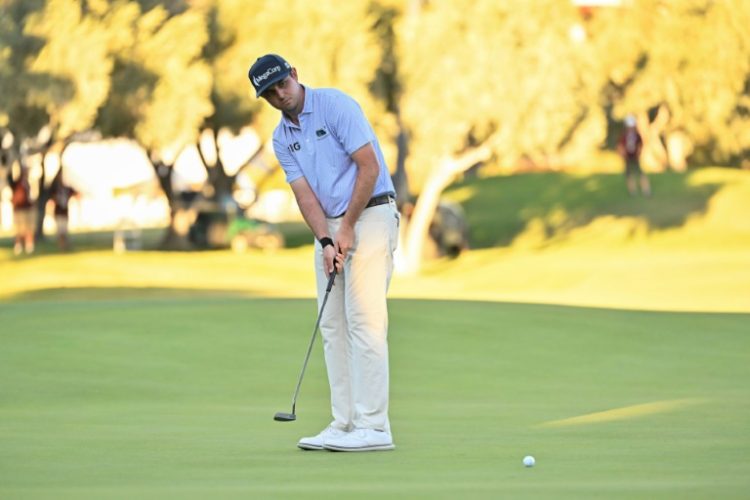 American  J.T. Poston putts for victory at the 72nd hole of the US PGA Tour Shriners Children's Open. ©AFP