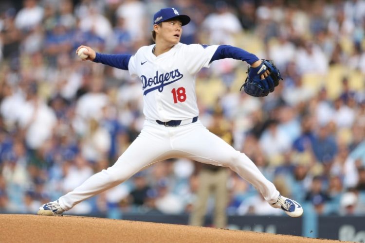 Yoshinobu Yamamoto of the Los Angeles Dodgers delivers a pitch in a series-clinching victory over the San Diego Padres in the MLB playoffs. ©AFP