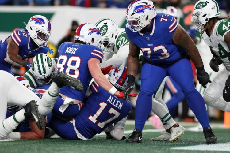 Buffalo quarterback Josh Allen scores a touchdown in the Bills' NFL victory over the New York Jets. ©AFP