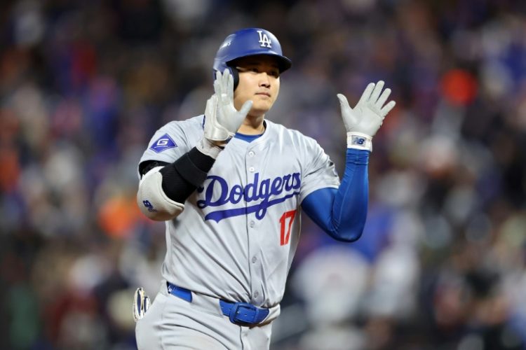 Shohei Ohtani of the Los Angeles Dodgers celebrates hitting a three-run homer in a Major League Baseball playoff victory over the New York Mets. ©AFP