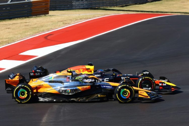 Side-by-side: Max Verstappen and Lando Norris locked in a tense battle at the United States Grand Prix on Sunday. ©AFP