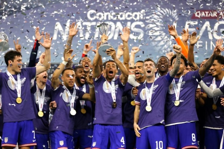 The United States, shown celebrating a victory in this year's CONCACAF Nations League final, will hope to win the next two title matches on home soil at SoFi Stadium near Los Angeles under plans announced by the regional governing body. ©AFP