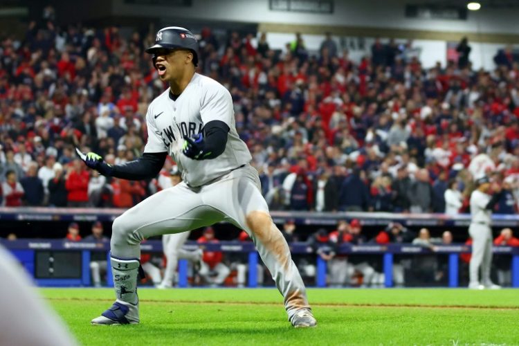 Juan Soto of the New York Yankees celebrates after hitting the three-run homer in the 10th inning thave gave his team a 5-2 victory at Cleveland and a trip to the World series for the first time since 2009. ©AFP