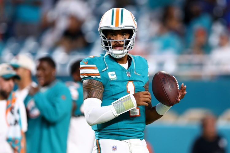 Quarterback Tua Tagovailoa of the Miami Dolphins has passed NFL concussion protocol and is set to return after missing four games when the club faces Arizona on Sunday. ©AFP