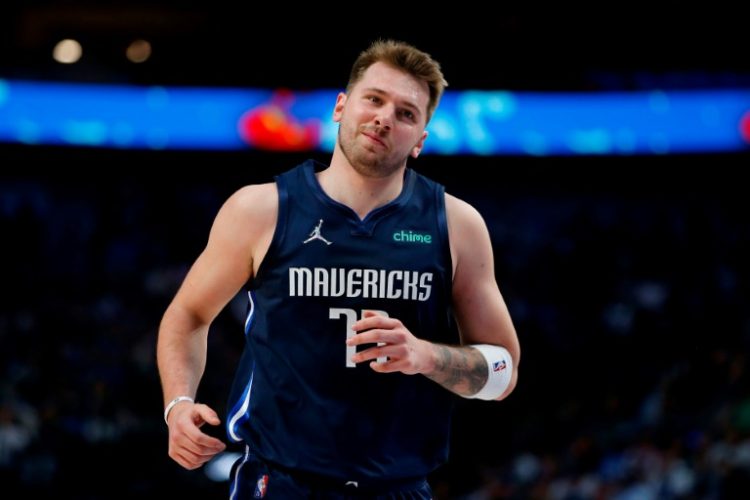 Dallas Mavericks star Luka Doncic has a calf contusion that will sideline him during the NBA team's pre-season training camp. ©AFP