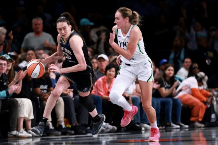 New York Liberty forward Breanna Stewart drives past Alanna Smith of the Minnesota Lynx in game two of the WNBA Finals. ©AFP