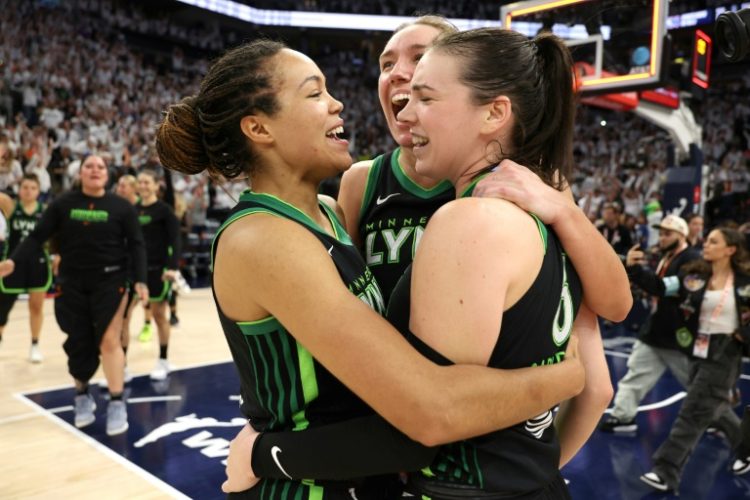 Napheesa Collier and Bridget Carleton of the Minnesota Lynx celebrate with after defeating the New York Liberty in game four of the WNBA Finals. ©AFP