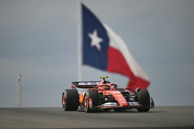 On the pace: Ferrari's Carlos Sainz takes part in practice . ©AFP