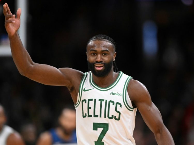 Boston's Jaylen Brown celebrates after sinking a 3-pointer in Boston's NBA victory over Minnesota. ©AFP