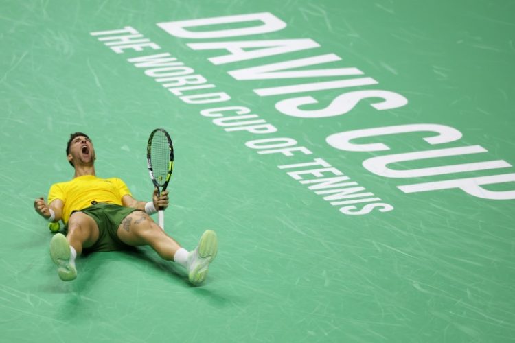 Australia's Thanasi Kokkinakis celebrates  after winning his match against Ben Shelton of Team USA. ©AFP