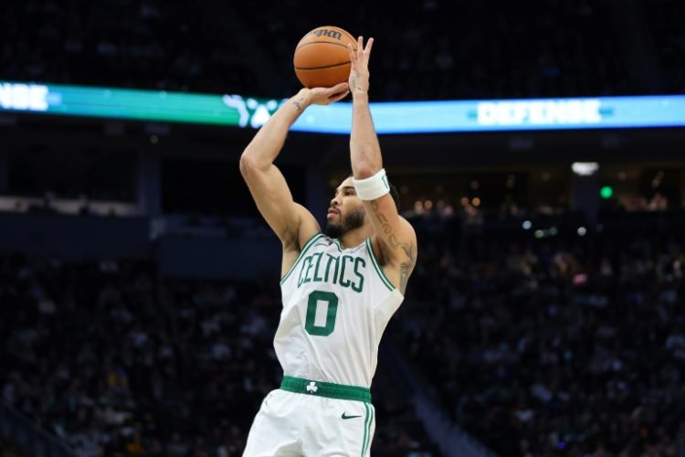 Boston's Jayson Tatum scored 31 points and grabbed 12 rebounds to lead the Celtics in an NBA triumph at Milwaukee. ©AFP