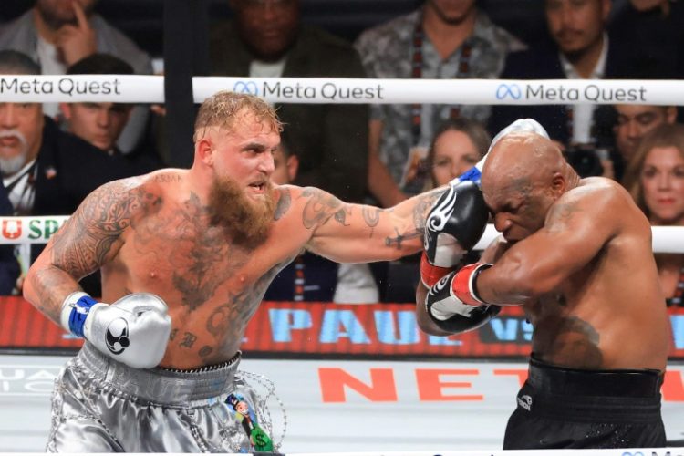 'No regrets': Mike Tyson takes a punch from Jake Paul. ©AFP