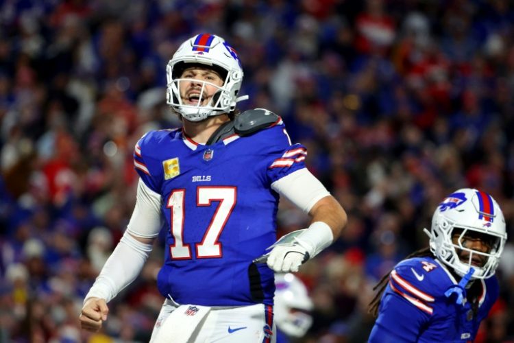 Josh Allen celebrates after his rushing touchdown in Sunday's win over Super Bowl chamions the Kansas City Chiefs.. ©AFP