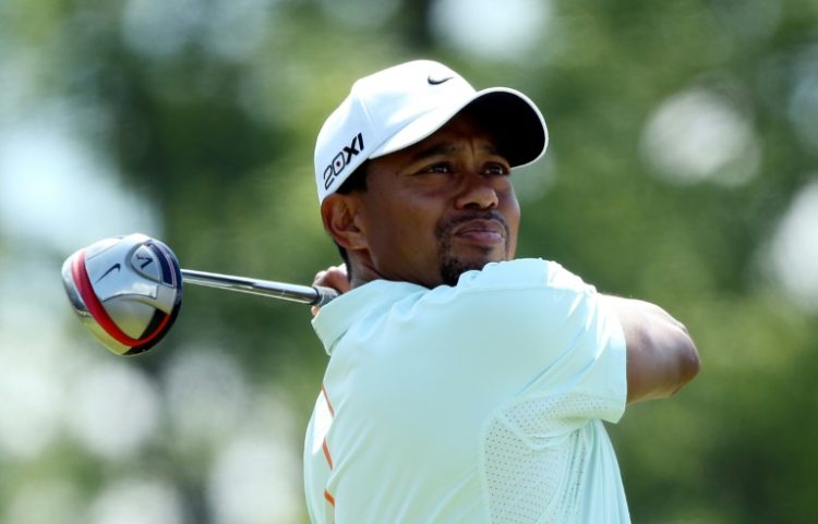 Tiger Woods said he will not compete in this year's Hero World Challenge but will serve as host for his December golf event in the Bahamas, which follows his back surgery last September. ©AFP