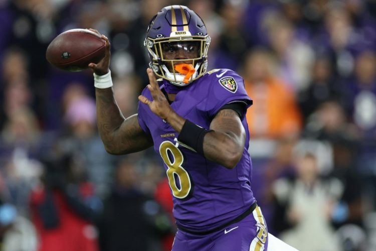 Lamar Jackson led a second-half fightback as Baltimore defeated Cincinnati 35-34. ©AFP